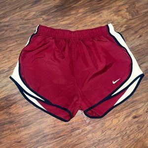 Maroon Nike running shorts